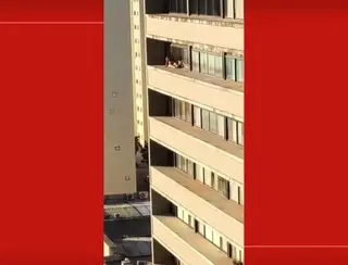 VÍDEO: Mulher se arrisca e toma sol em marquise de prédio no DF